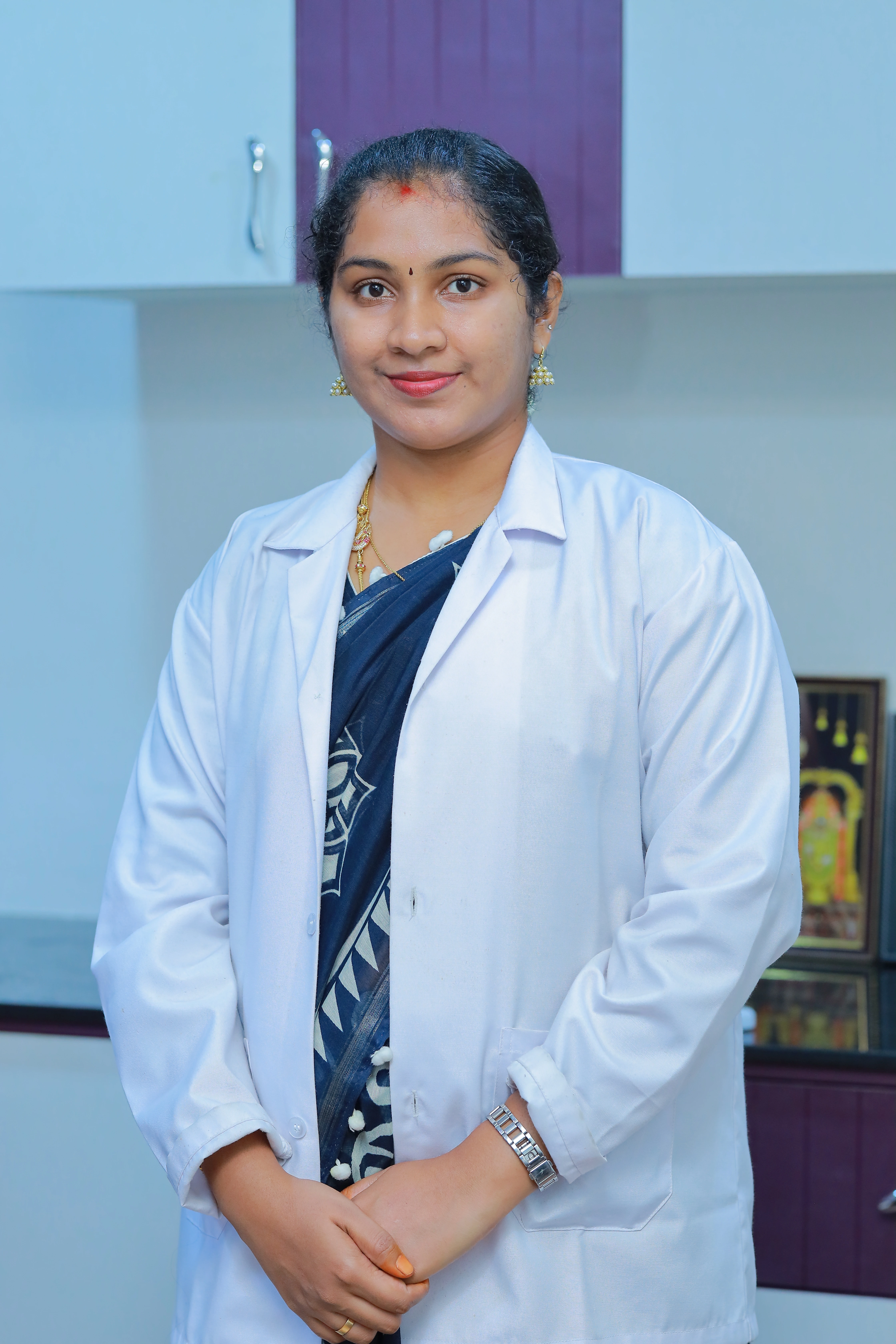 Dr. Nithya Bakialakshmi K - Periodontist & Implantologist